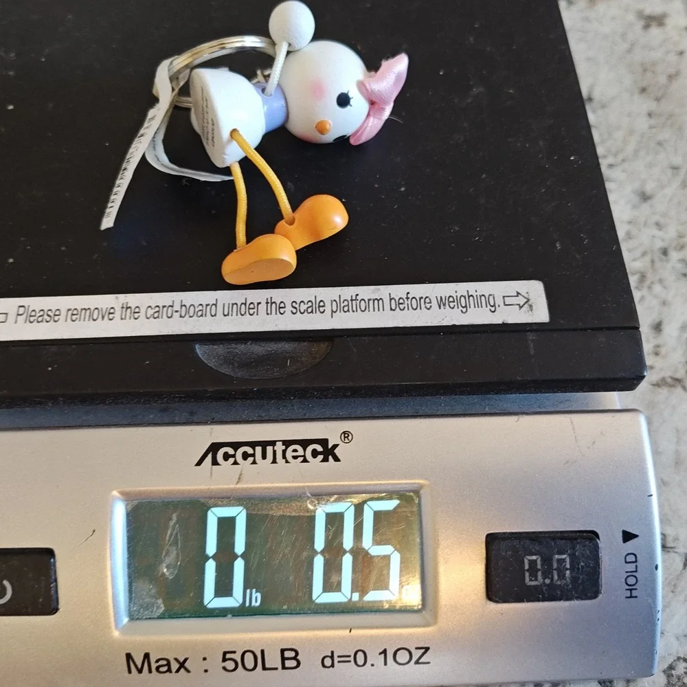Disney Daisy Duck Keychain White Pink Wooden Figural Dangling Legs